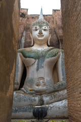 The Buddha image in Wat Sri Chum temple at Sukhothai Historical