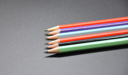 Drawing supplies: assorted color pencils, isolated on background