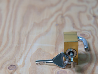  locked padlock with the key on it