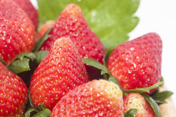 closed up of wet strawberry in bowl