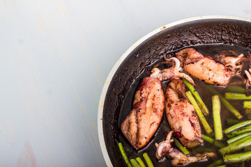 Fried squid with chives.