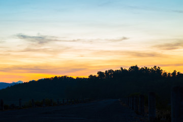 View of misty fog mountains in sunrise time