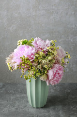Bouquet of flowers: peony, matricaria and serruria florida (blus