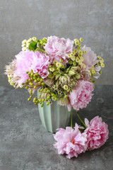Bouquet of flowers: peony, matricaria and serruria florida (blus