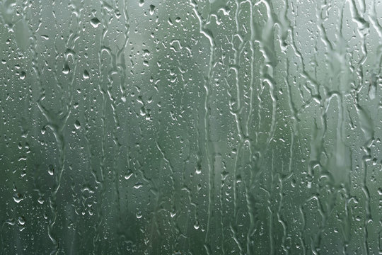 real rain drops on window glass in high resolution