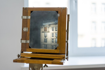 Vintage box camera with a wooden body