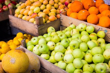 counter with vegetables and fruits in the market