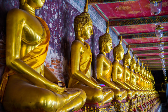 Buddha  image in Wat Suthat Thep Wararam is a Buddhist temple in Bangkok, Thailand.