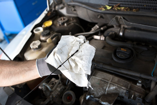 Checking the oil in a car