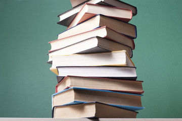 Stack of colorful books. Education background. Back to school. Copy space for text.