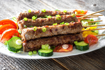 Minced meat kebab with fresh vegetable