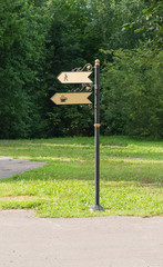 post indicating directions. a place for an inscription