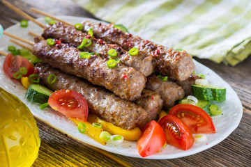 Minced meat kebab with fresh vegetable