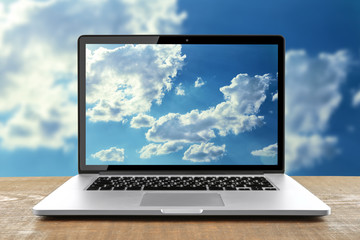 Laptop on the table. Cloud storage concept