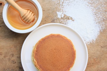 tasty pancake with honey