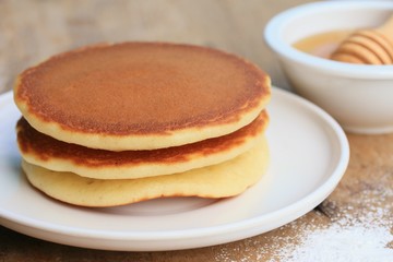 tasty pancake with honey