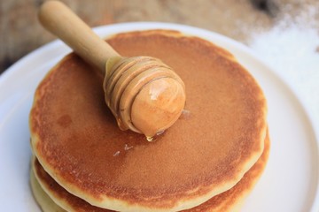 tasty pancake with honey
