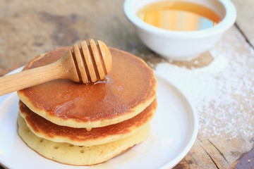 tasty pancake with honey