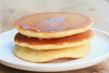 tasty pancake with honey