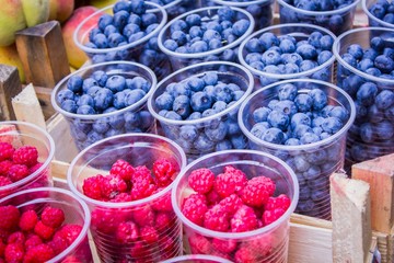 Fresh ripe raspberries and blueberries