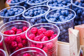 Fresh ripe raspberries and blueberries
