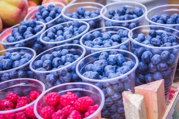 Fresh ripe raspberries and blueberries