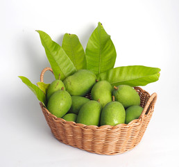 green mango in basket