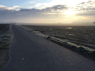 sunrise at a frosty field