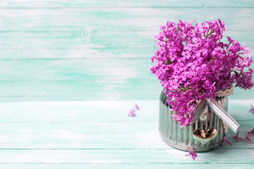 Flowers on wooden background.