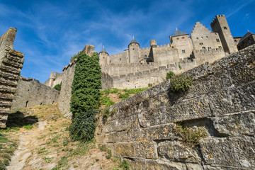 Fototapeta na wymiar View from below of Castle fortress of Carcassonne in the south of France
