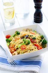 Delicious spaghetti with mushroom, broccoli and tomato