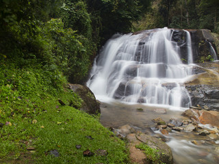Fototapeta na wymiar waterfall and the creek and rock in Thailand