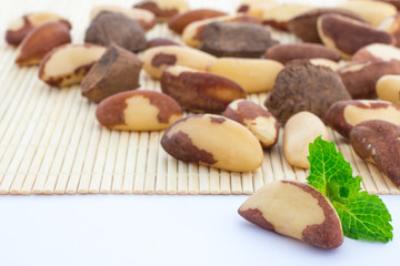 Brazil Nuts and some copy space. Bunch of nuts (bertholletia excelsa) with selective focus.
