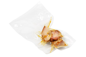 vacuum packed pieces of sturgeon on the white background with clipping path - 117590329