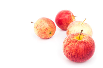 Red apples on white background