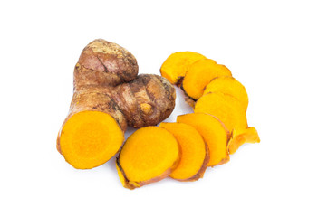 Closeup turmeric roots slices on white background