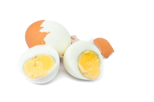 Closeup Peeled boiled egg and half egge on white background , food menu concept