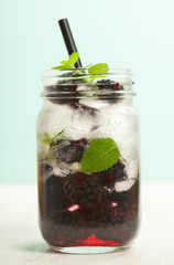 Infused water with fresh organic mulberry and mint