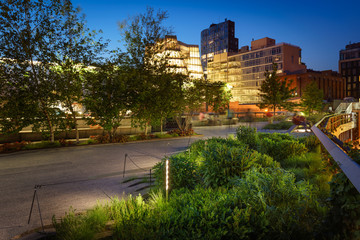 Fototapeta na wymiar The Highline at twilight in summer. The aerial green-way also called High Line or High Line Park is an oasis in the heart of Chelsea, Manhattan, New York City