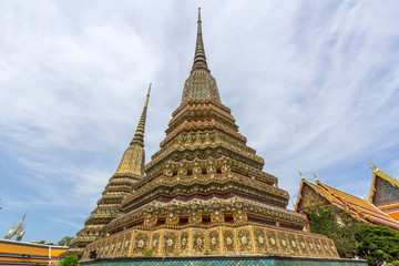 Fototapeta na wymiar Stupas of Wat Po Buddhist temple complex in Bangkok, Thailand.