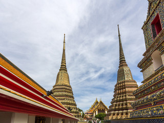 Fototapeta premium Stupas of Wat Po Buddhist temple complex in Bangkok, Thailand.