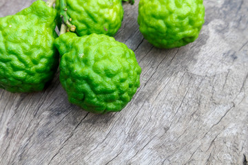 Closeup bergamot on old wood background, selective focus