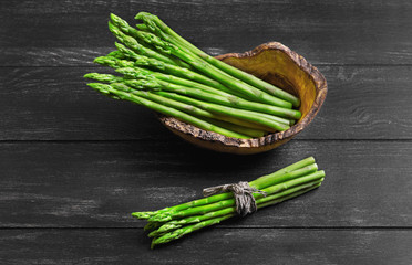 Asparagus green on dark black background