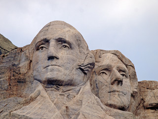 Sculpted images of Presidents George Washington and Thomas Jefferson at Mt. Rushmore National Memorial, Keystone, South Dakota, U.S.A.