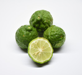 Bergamot with green leafs on wood background