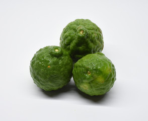 Bergamot with green leafs on wood background