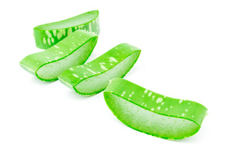 Closeup fresh aloe vera slice on white background, beauty and healthy care concept, selective focus