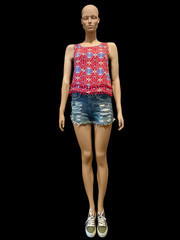 Female mannequin dressed in shorts and top
