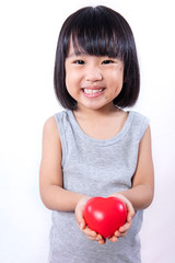 Asian Little Chinese Girl Holding Red Heart