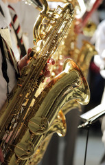 Fototapeta premium musician plays the saxophone in the orchestra at the station in Moscow.